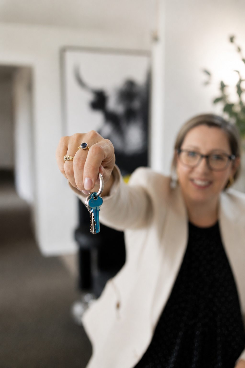 Michelle handing over the keys to a new home